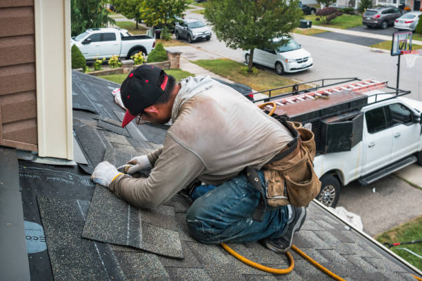 Professional Roofing technician working in Stanwood, MI